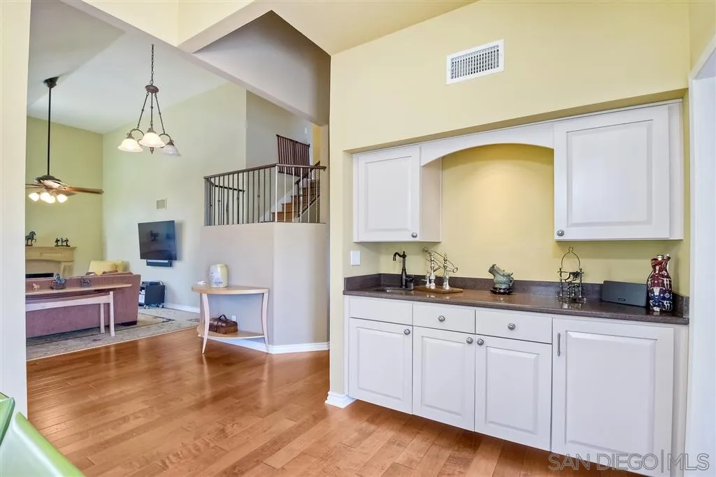 3622 Garner Place Encinitas, CA 92024 - Photo 10 of 25 a spacious bathroom with a granite countertop sink a mirror and a bathtub