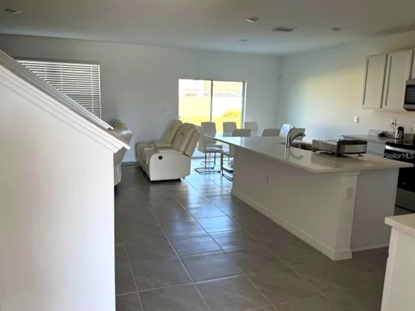 a kitchen with a cabinets and counter space