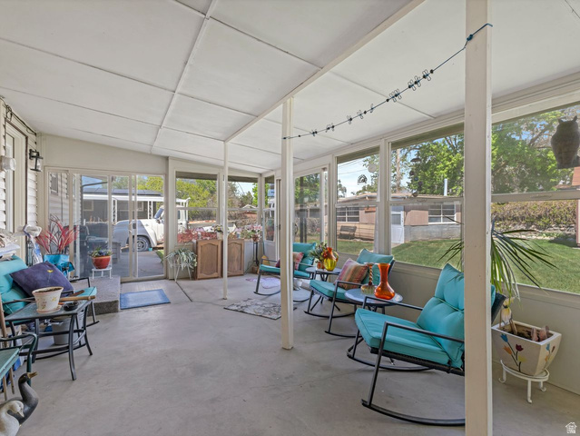 1502 North 475 West Sunset, UT 84015 - Photo 17 of 23 Screened patio with a paneled ceiling and solid flooring