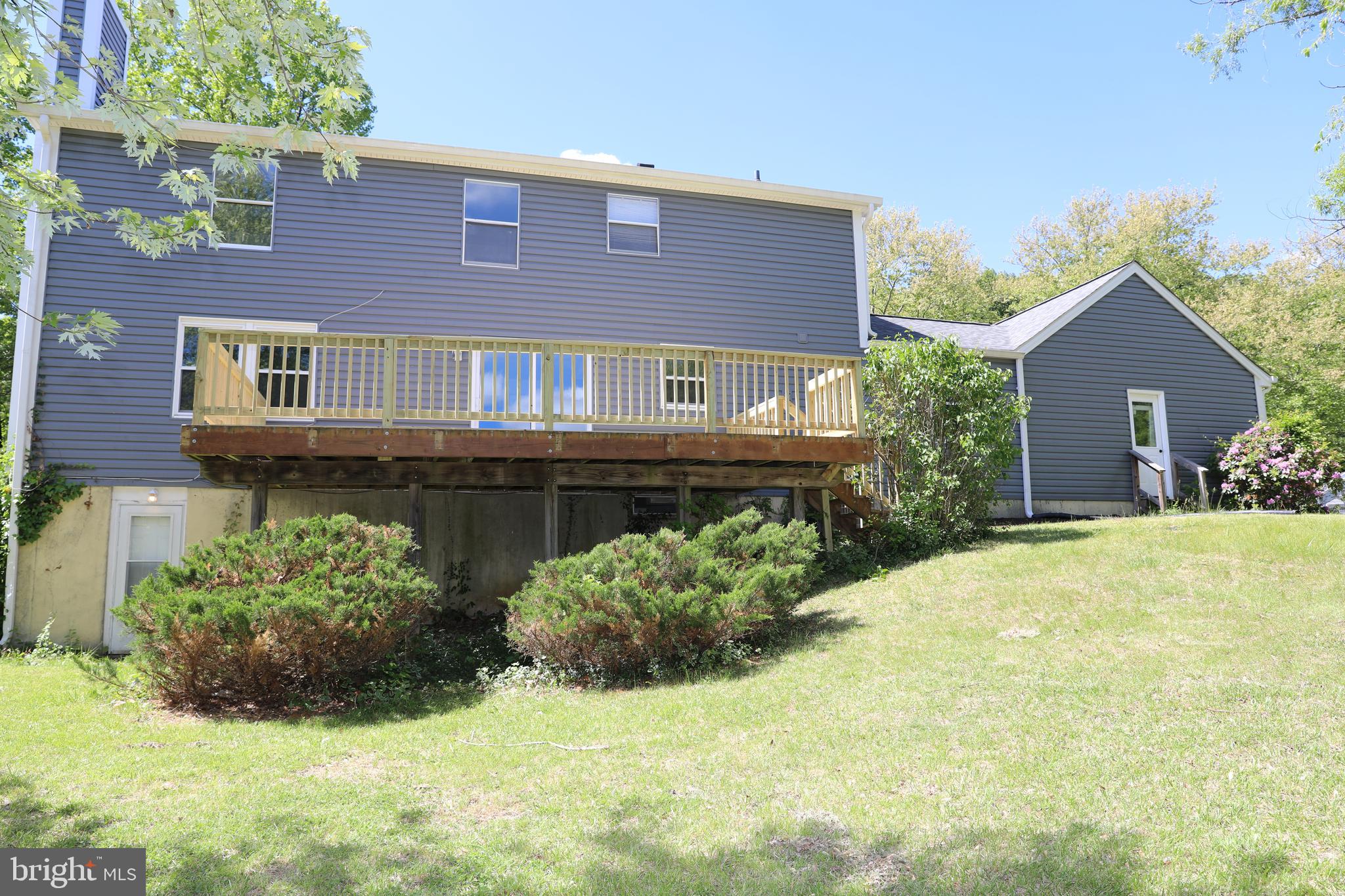 8106 Triple Crown Road Bowie, MD 20715 - Photo 6 of 21 a front view of a house with a yard