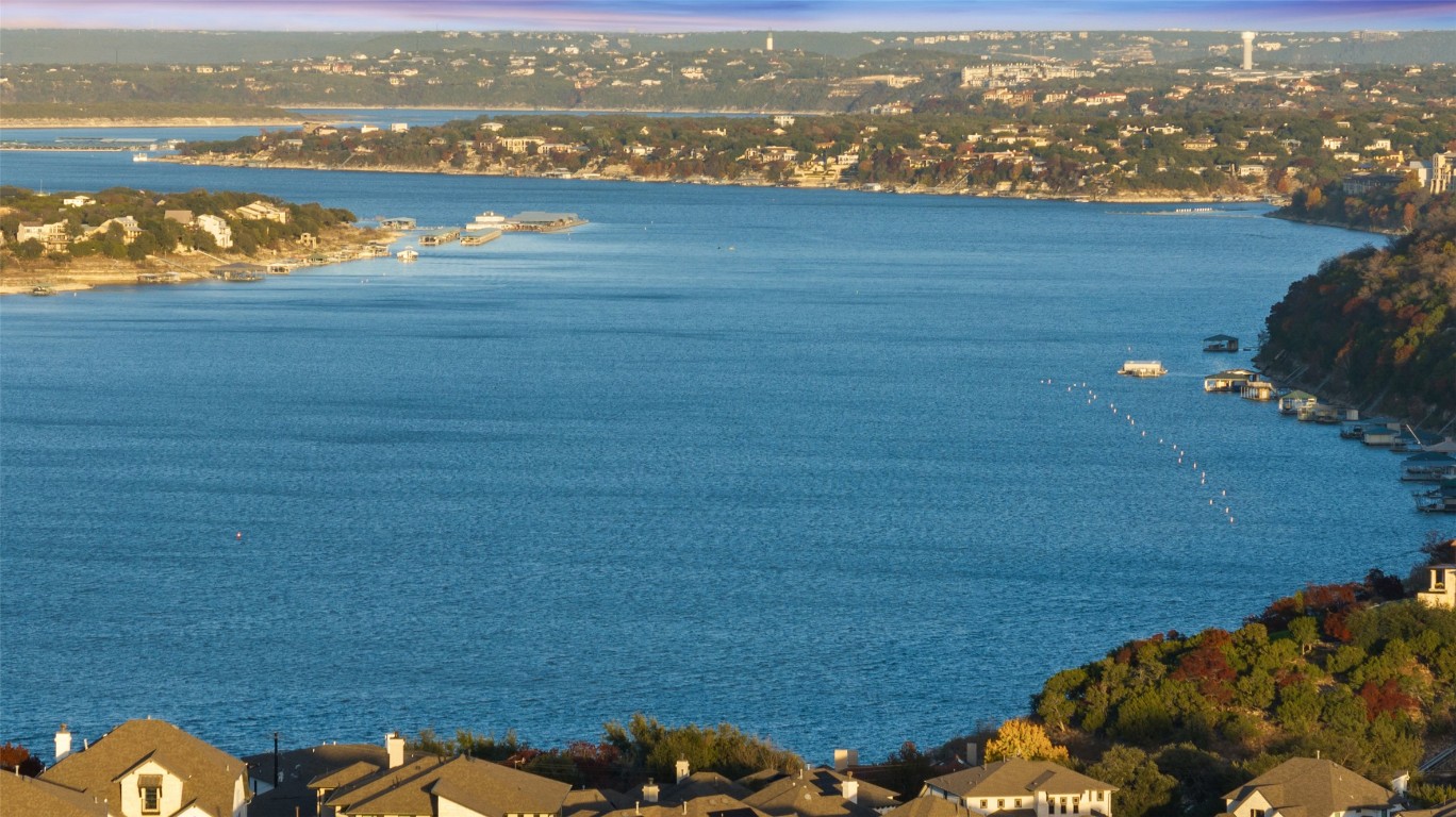 2814 Lakehurst Road Spicewood, TX 78669 - Photo 2 of 8 a view of lake with city view
