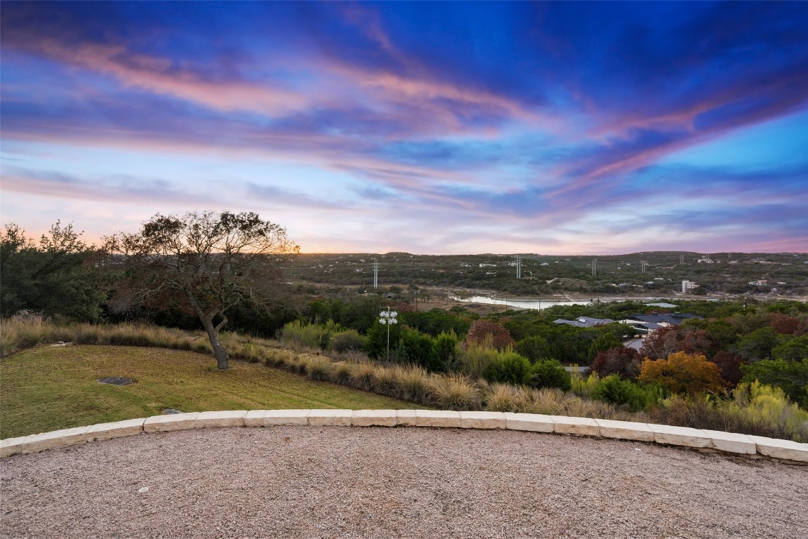 2814 Lakehurst Road Spicewood, TX 78669 - Photo 8 of 8 a view of a lake with a city