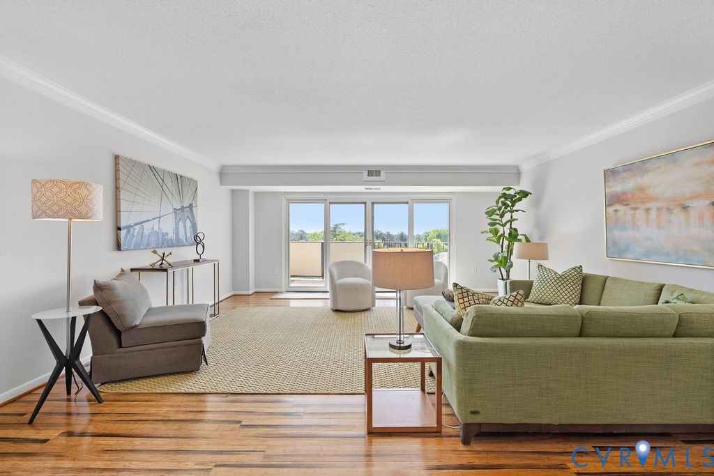 2956 Hathaway Road, Unit U704 Richmond, VA 23225 - Photo 10 of 42 Spacious living area featuring wood-finish floorin