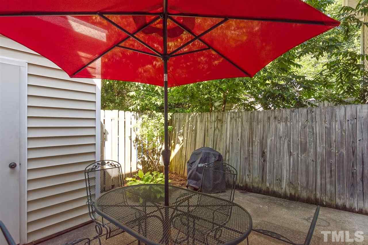 5845 Shady Grove Circle Raleigh, NC 27609 - Photo 15 of 16 a backyard of a house with seating space