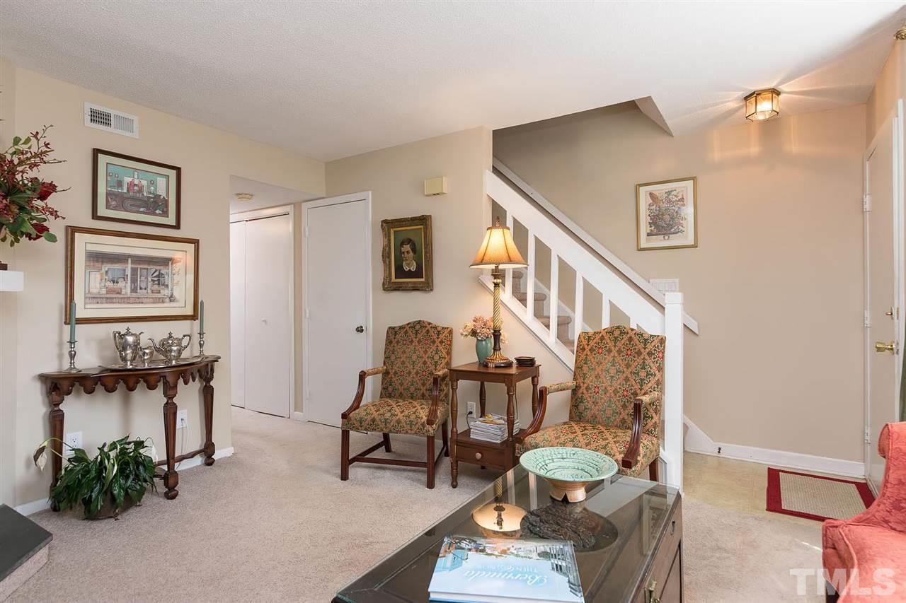 5845 Shady Grove Circle Raleigh, NC 27609 - Photo 4 of 16 a living room with furniture and wooden floor