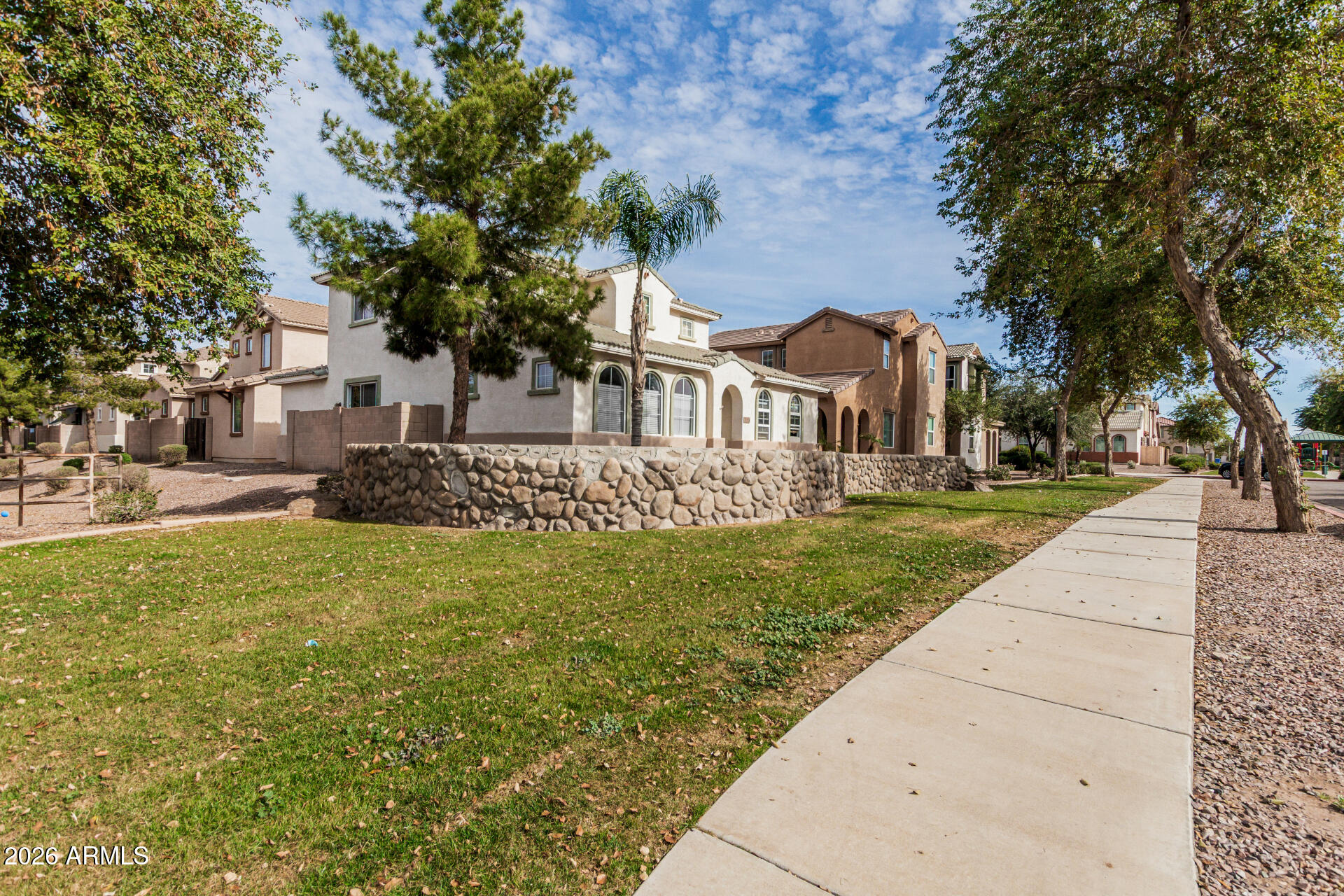 5446 Fulton Street Phoenix, AZ 85043 - Photo 38 of 42 a front view of a house with a yard