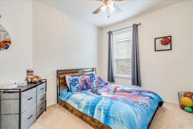 a bathroom with a tub and shower