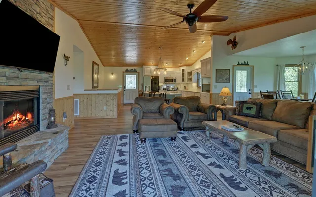 a bedroom with a bed and a fireplace