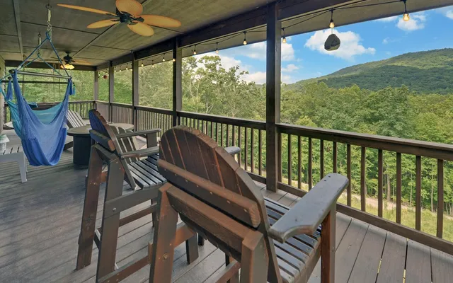 a living room with a flat screen tv and a window