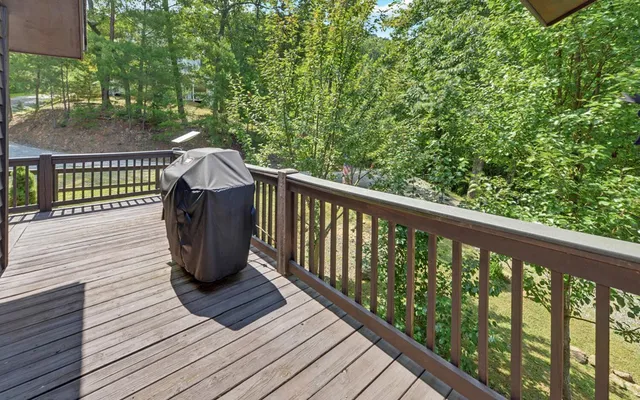 a living room with furniture and a piano