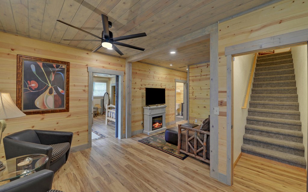445 Tranquil Cove Road Murphy, NC 28906 - Photo 37 of 77 a view of a livingroom with furniture and a ceiling fan