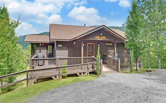 a view of a dining area with furniture and wooden floor