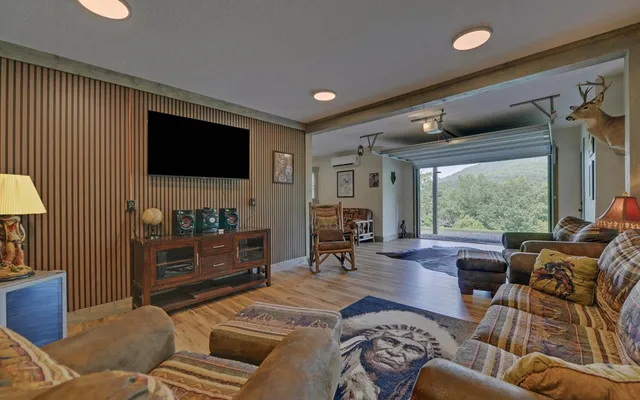 a view of a dry yard with mountains in the background