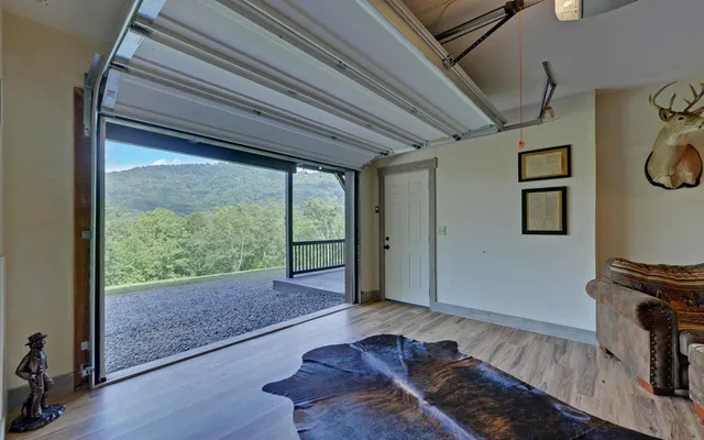 a view of yard with swimming pool and green space