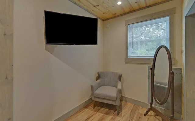 a view of a house with a yard patio and sitting area