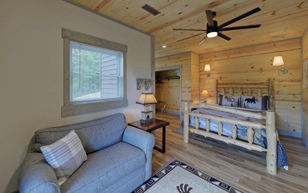 445 Tranquil Cove Road Murphy, NC 28906 - Photo 52 of 77 a living room with furniture and a piano