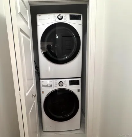a utility room with dryer and washer