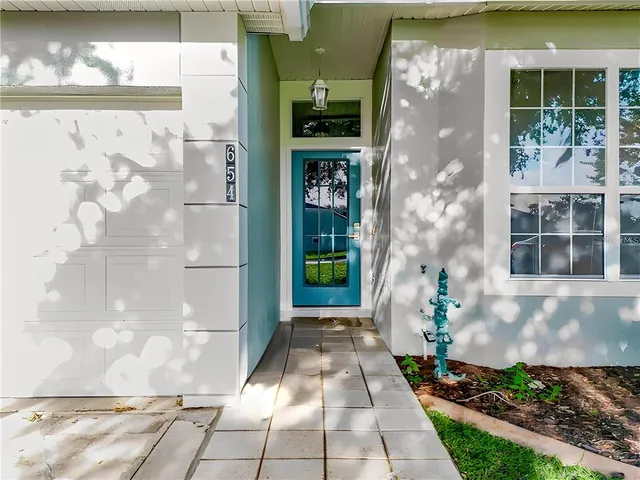 a front view of a house with a porch