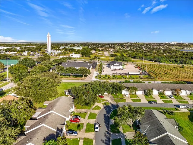 a kitchen with cabinets appliances a sink and a stove