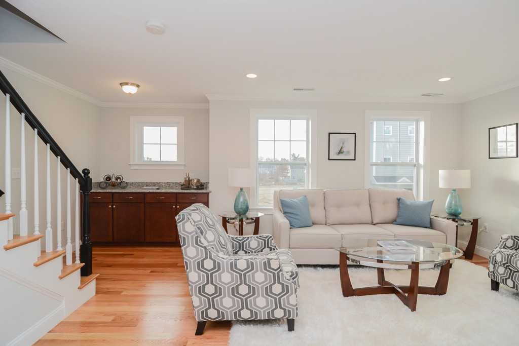 1400 Gorham Street, Unit 40 Lowell, MA 01852 - Photo 9 of 19 a living room with furniture and a window
