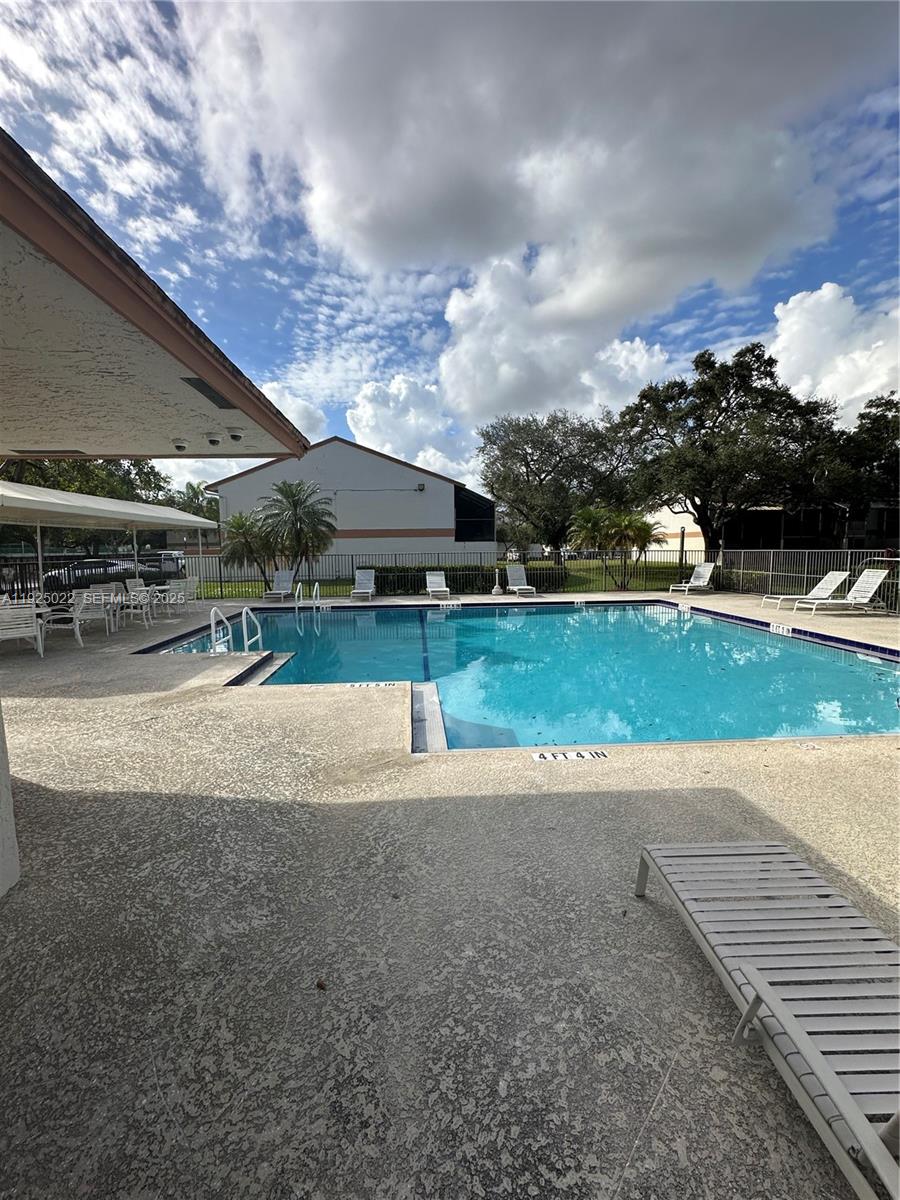 4220 Southwest 71st Terrace Davie, FL 33314 - Photo 2 of 16 a view of a backyard