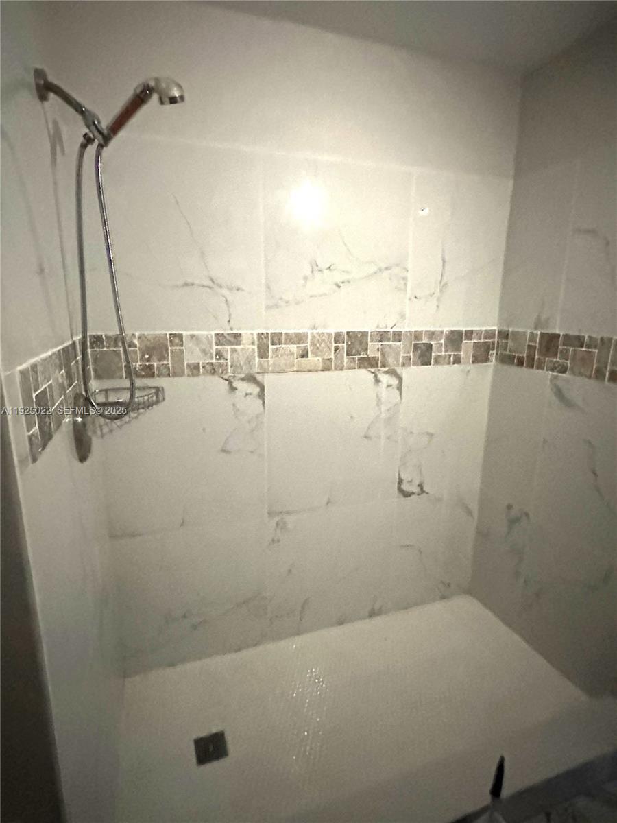 4220 Southwest 71st Terrace Davie, FL 33314 - Photo 5 of 16 a bathroom with a shower