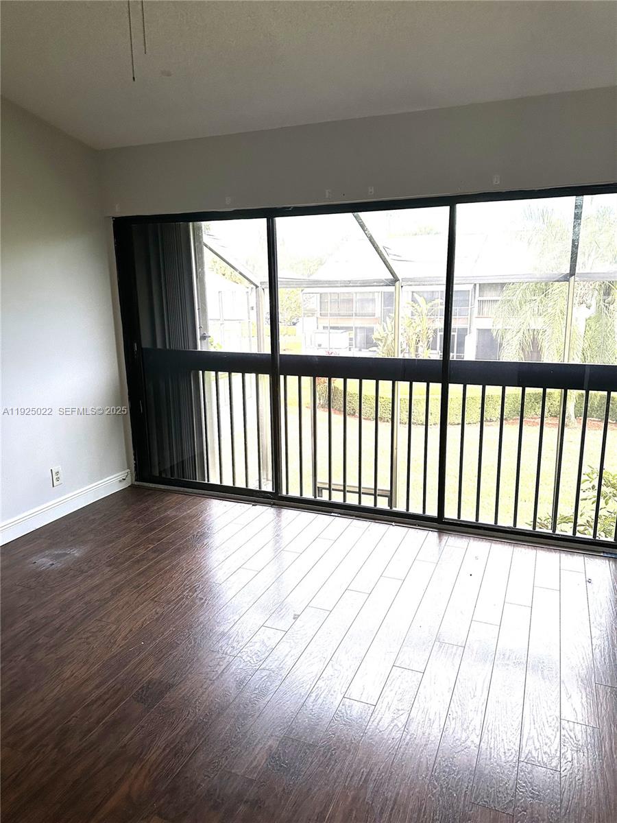 4220 Southwest 71st Terrace Davie, FL 33314 - Photo 7 of 16 a view of balcony with wooden floor