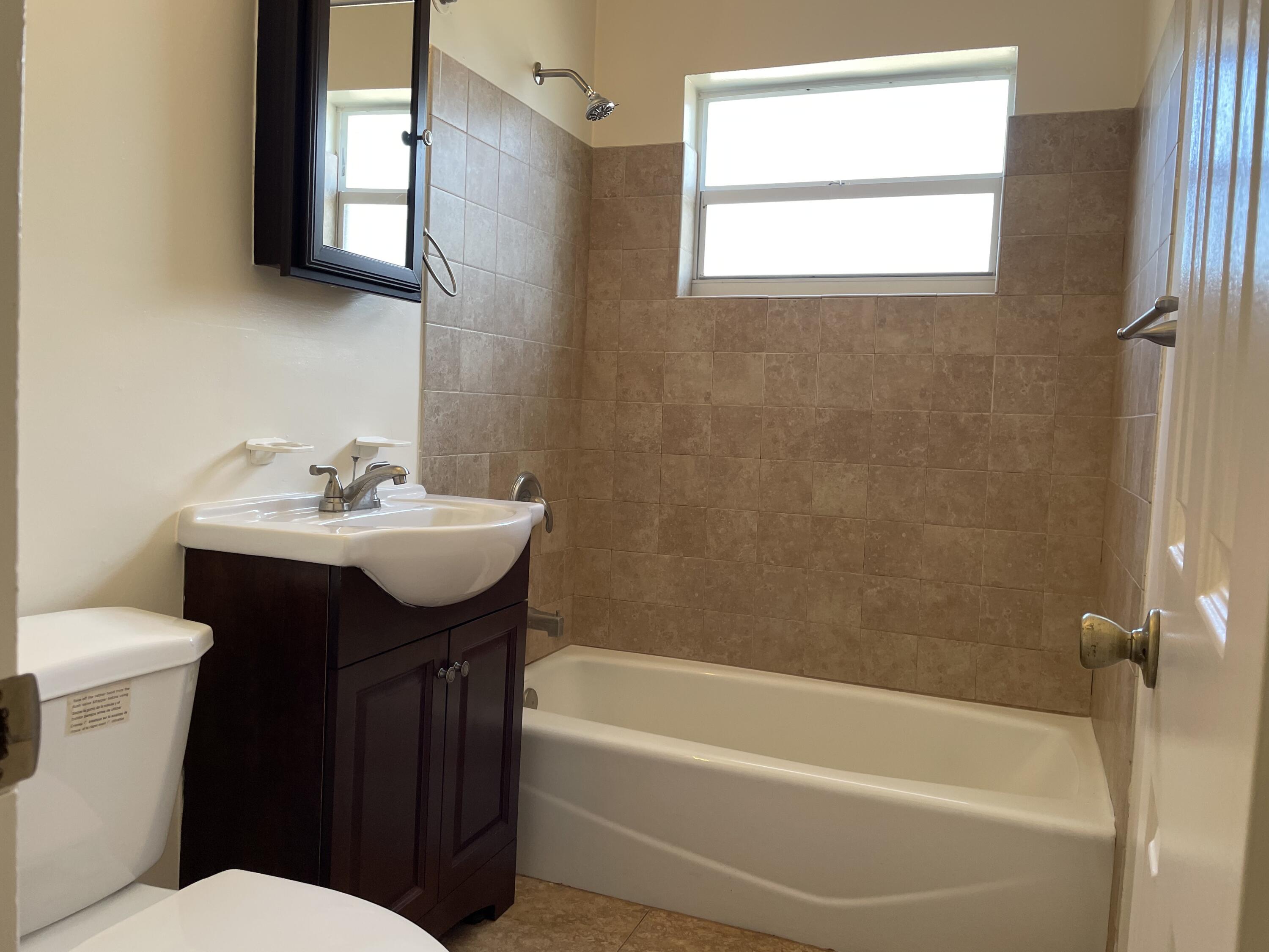166 West 25th Street Riviera Beach, FL 33404 - Photo 7 of 14 IMG_5466