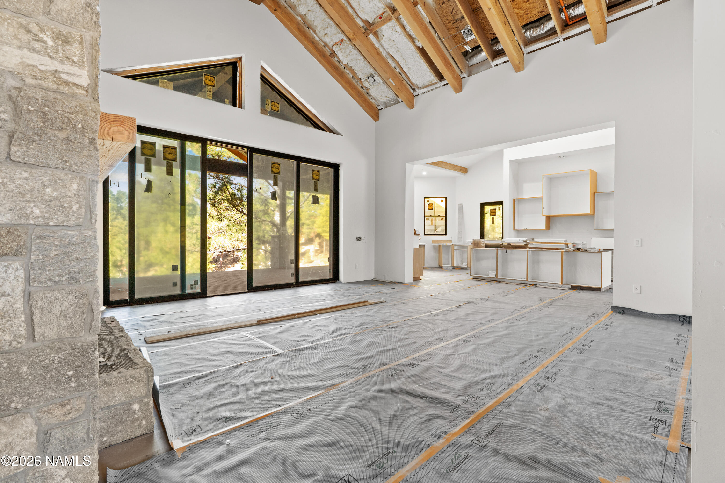3440 South Pimlico Flagstaff, AZ 86005 - Photo 5 of 18 a spacious bedroom with a large bed and a large window