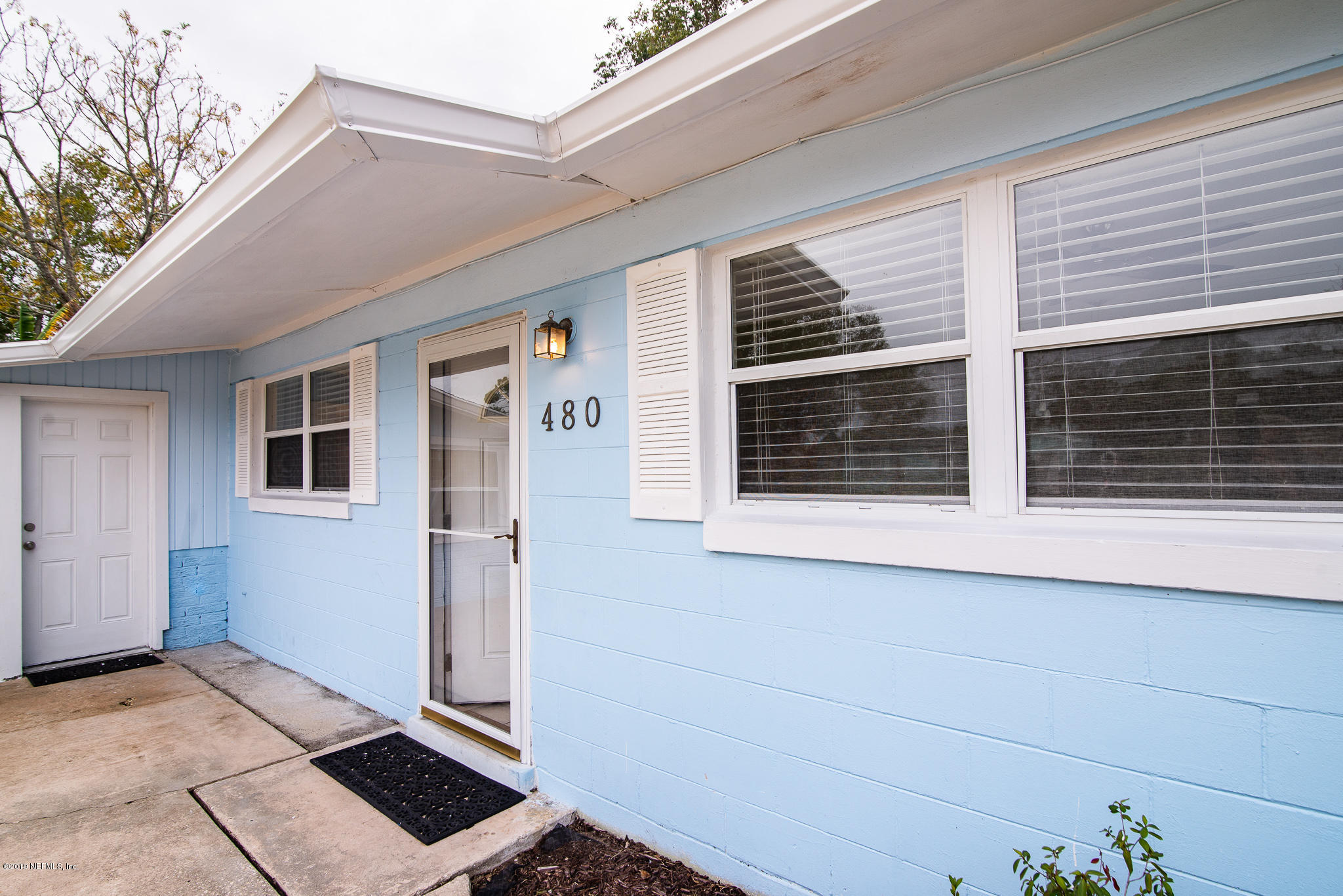 480 Irex Road Atlantic Beach, FL 32233 - Photo 3 of 26 a view of a house with a door