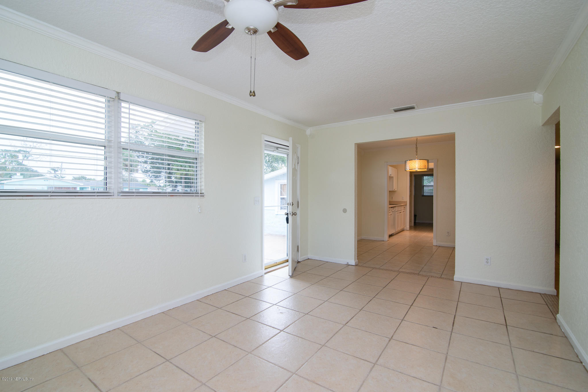 480 Irex Road Atlantic Beach, FL 32233 - Photo 5 of 26 a view of an empty room with a window