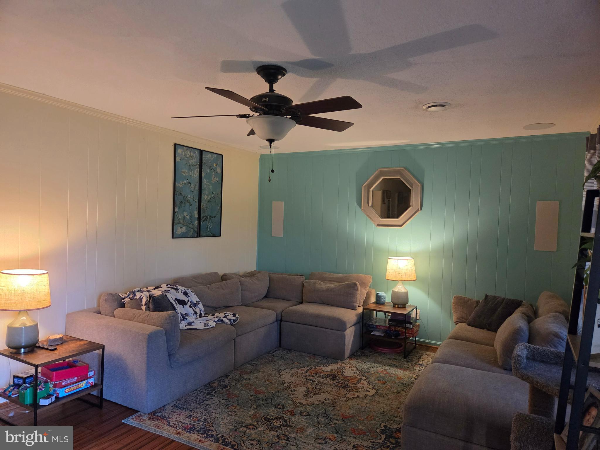 21245 Tanyard Road Preston, MD 21655 - Photo 6 of 10 a living room with furniture and a fan