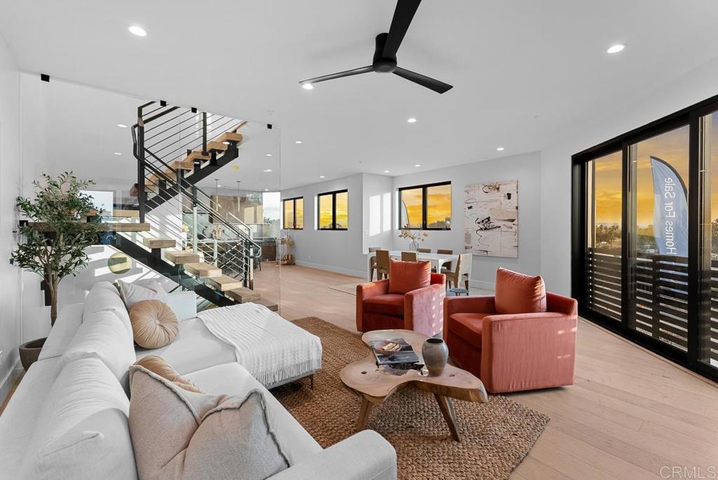 4224 Tonopah Avenue San Diego, CA 92110 - Photo 10 of 38 a living room with furniture or window and a wooden floor