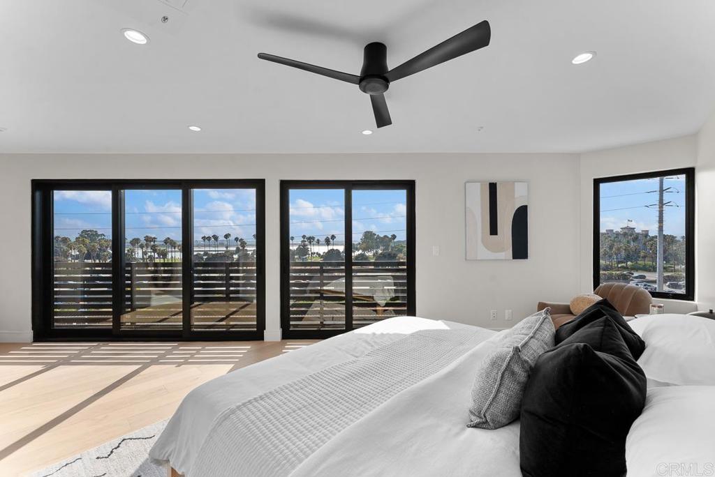 4224 Tonopah Avenue San Diego, CA 92110 - Photo 15 of 38 a bedroom with a bed and a large window