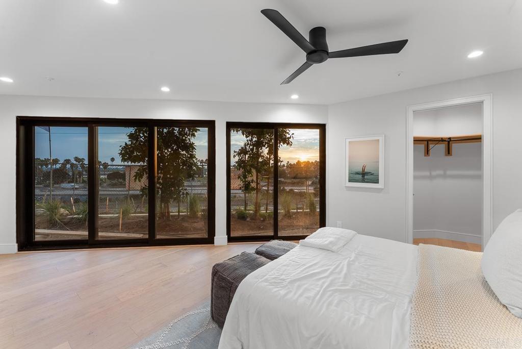 4224 Tonopah Avenue San Diego, CA 92110 - Photo 28 of 38 a bedroom with a large bed and a large window