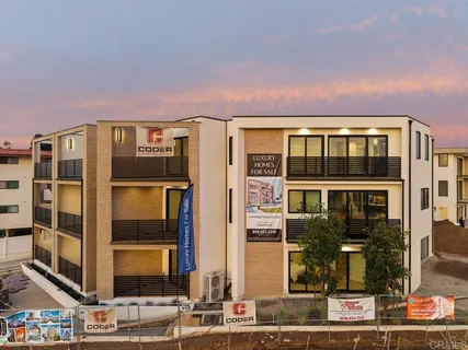 a front view of building with glass windows