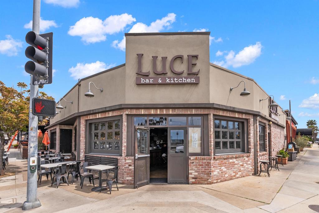 4224 Tonopah Avenue San Diego, CA 92110 - Photo 34 of 38 a view of a building with retail shops