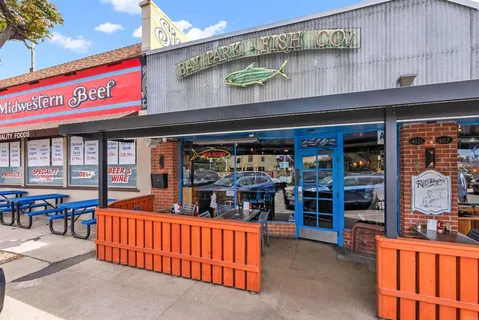 a view of shops in a street