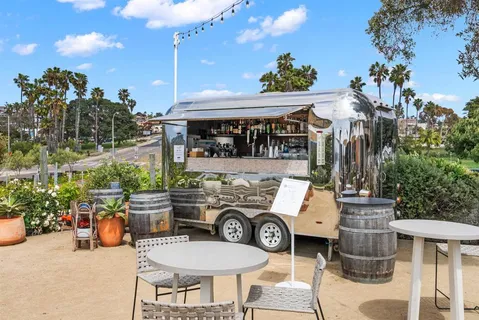 a view of a building with retail shops