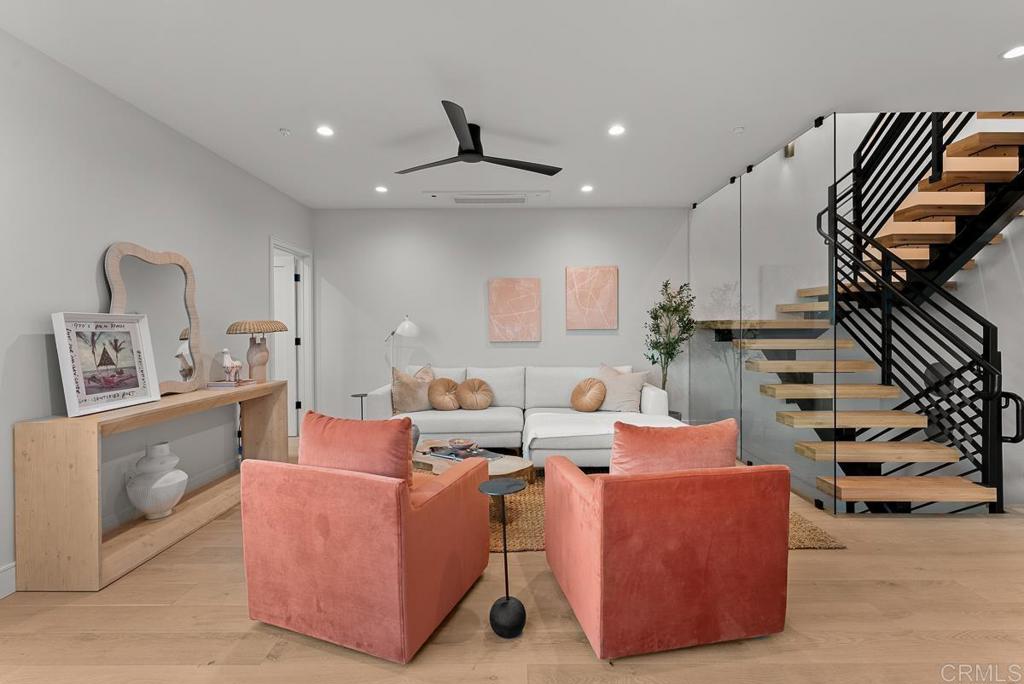 4224 Tonopah Avenue San Diego, CA 92110 - Photo 8 of 38 a living room with furniture and a flat screen tv