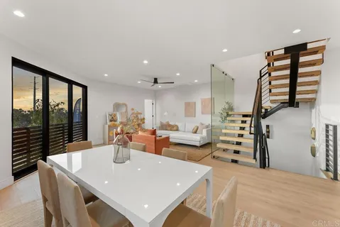 a large living room with large windows