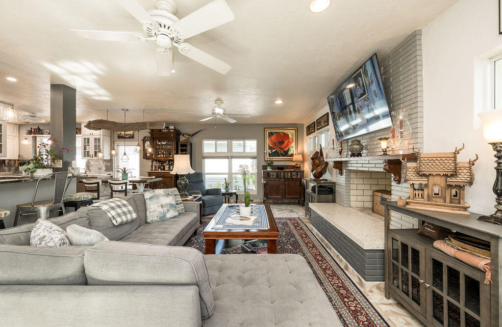 1407 Rose Street Key West, FL 33040 - Photo 19 of 74 a living room with furniture fireplace and a large window
