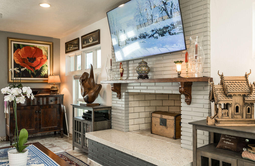 1407 Rose Street Key West, FL 33040 - Photo 20 of 74 a kitchen with stainless steel appliances kitchen island granite countertop a stove a sink and a microwave
