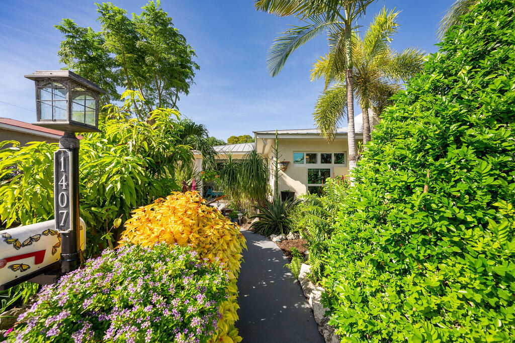1407 Rose Street Key West, FL 33040 - Photo 3 of 74 a view of a garden with plants