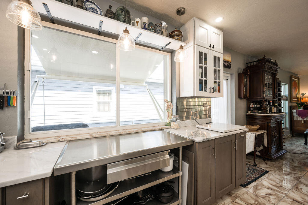 1407 Rose Street Key West, FL 33040 - Photo 31 of 74 a kitchen with a sink and a window