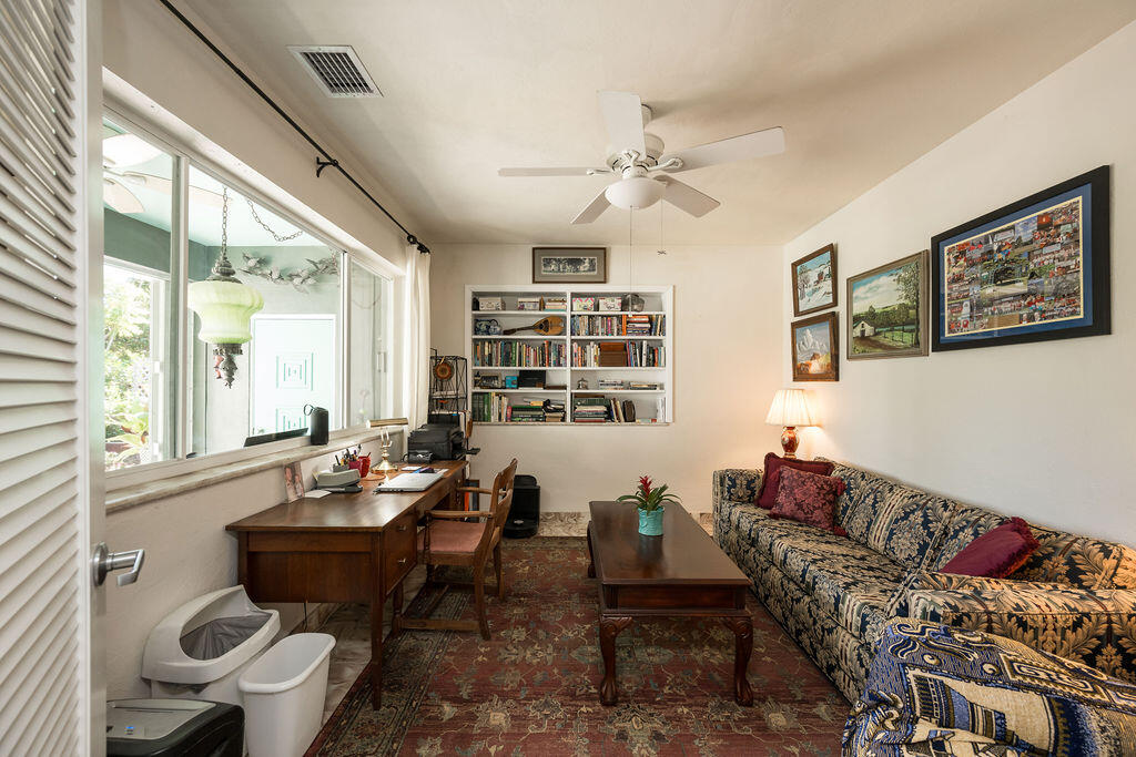 1407 Rose Street Key West, FL 33040 - Photo 36 of 74 a living room with furniture and a large window