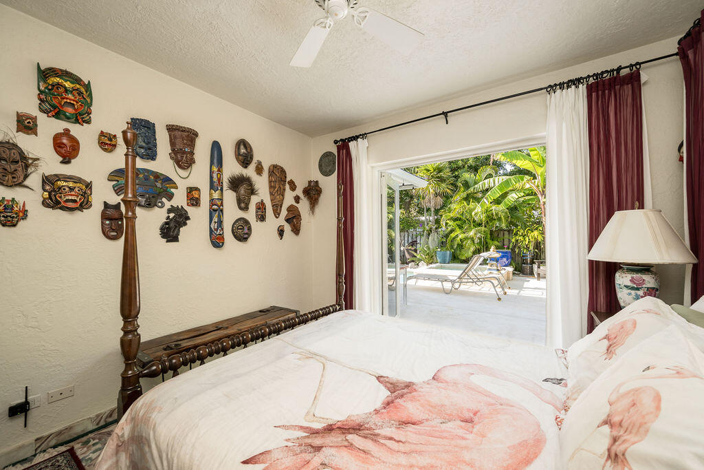 1407 Rose Street Key West, FL 33040 - Photo 46 of 74 a bed room with a bed and a window