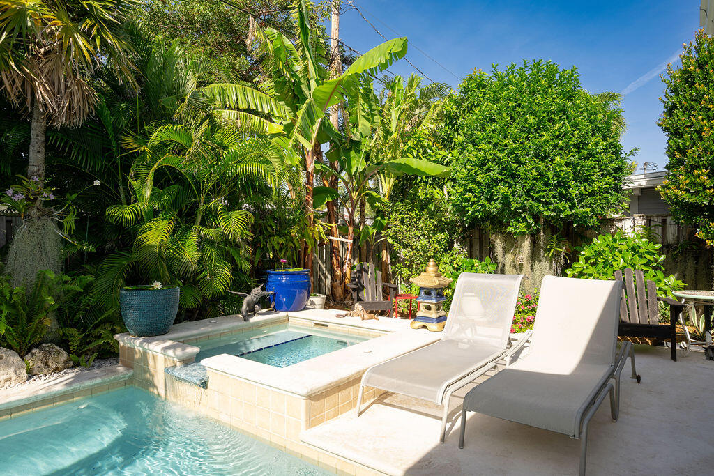 1407 Rose Street Key West, FL 33040 - Photo 52 of 74 a view of a chairs and tables in the patio