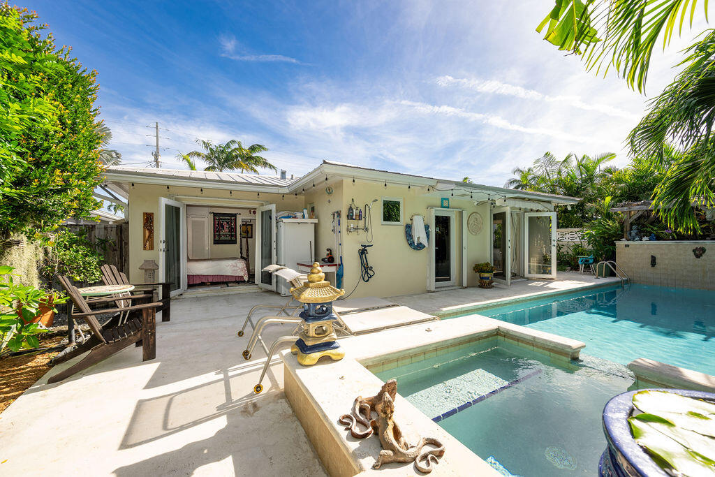 1407 Rose Street Key West, FL 33040 - Photo 59 of 74 a view of a house with backyard porch and furniture