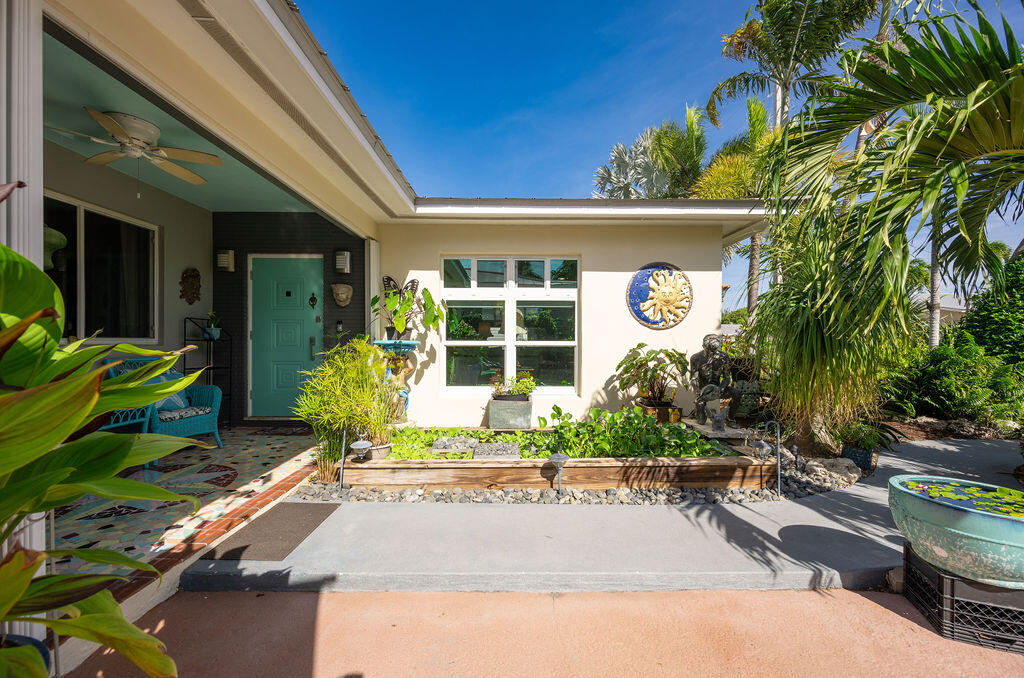 1407 Rose Street Key West, FL 33040 - Photo 10 of 74 a front view of a house with a yard